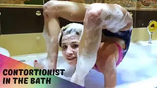 Contortionist in The Bath. Handstand