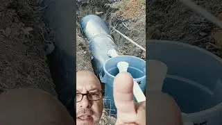 Trash can septic tank system