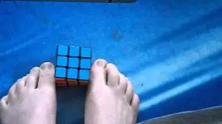 How to turn a Rubik's Cube with your feet.
