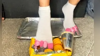 Crushing / Picking up pumpkin Oreos with my toes wearing toe socks