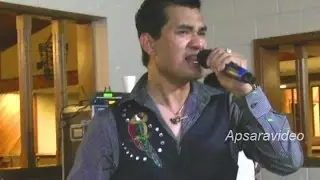 Sopheak of Sekmeas Band is  singing Khmer Cha Cha Cha   