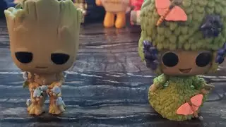 opening up the i am groot funko pop's