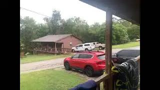 A rainy day view from outside the cabin