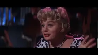 Sexy Shelley Winters as faded starlet Fay Estabrook is as pleased as punch her new man is jealous