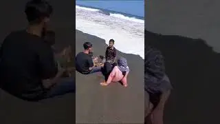 BERJEMUR DI PANTAI BERSAMA  ANAK