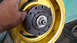 Repair of the KDN 210 mower. Replacement of the drive pulley bearings.