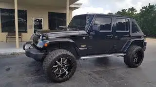 Jeep  2015 blk over blk loaded