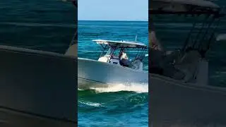 Small boat comes into Haulover Inlet