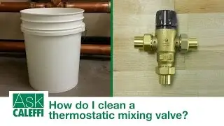 How do I clean a thermostatic mixing valve?