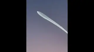 Drone footage of Space X Falcon 9 rocket soaring over San Diego, CA