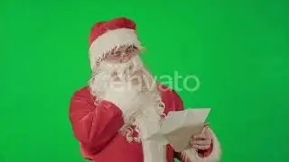 Santa Claus Reading Letters From Children on a Green Screen Chrome Key | Stock Footage - Envato ...