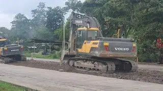 Volvo EC210 Excavator Removing Asphalt