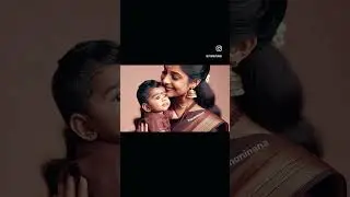 Indian mom kissing her baby boy on the forehead