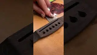 Replacement of the bridge on an acoustic guitar 