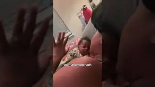 Mom is telling her baby boy the classic tale of Snow White in her own way!