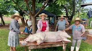 Butchering free-range pigs, frying bacon, and making lard for our neighbors.
