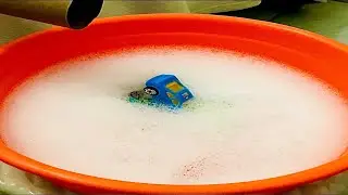 Diecast car leaving the super track and falling into the foamy water / Car sliding on the foam