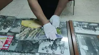 Finalizando el montaje de fotografías para la expo