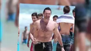 Hugh Jackman takes a shirtless dip in the sea on Bondi Beach.