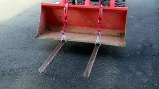 Homemade pallet forks for tractor on BX25 Kubota