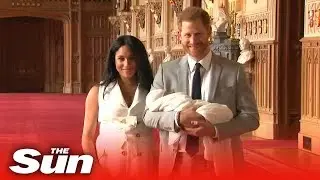 Prince Harry and Meghan Markle show off their new baby Archie to the world
