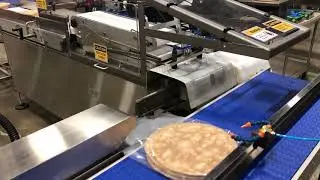 Flour tortilla bagger and heat sealer