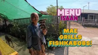 Mae grills live fish, 
