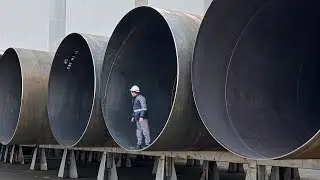 How Do They Create Huge Metal Pipes For The Whole City?