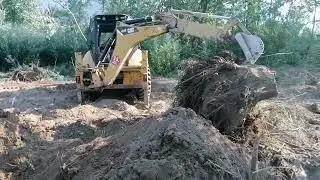 CAT 434E Büyük kökü koparıyor