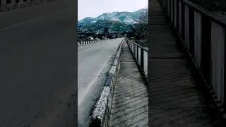 bridge leading to the mountains