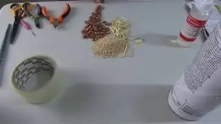 como hacer un instrumento reciclado fácil. palo de lluvia con botes de pringles,