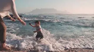 Fearless Toddler's Race Against Nature: Outrunning a Massive Tidal Wave!