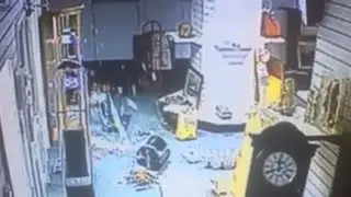 'Ghost' smashes glass door in 'haunted' auction house
