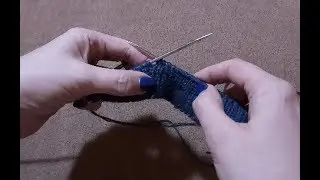 Knitted pants with knitting needles