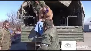 Ukrainian Azov militants disguised as women captured by Russian army in Mariupol.