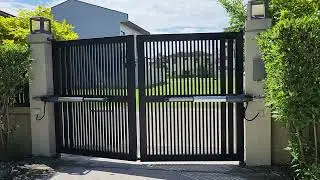 Automated swing gate, made from Stainless with powder coated finished
