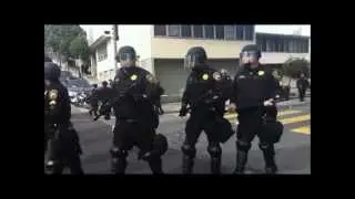 April 2, 2012: Police Push Protesters Into the Street [Read description]