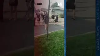 WARNING: Massive fight breaks out in front of a funeral home 