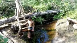 Dam on a stream, a man-made pond and a homemade ladder