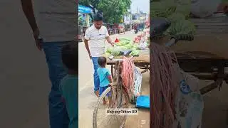তরমুজের দিকে তাকিয়ে আছে বাচ্চাটি!