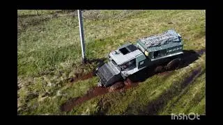 едем на вездеходе тром через  васюганские болота