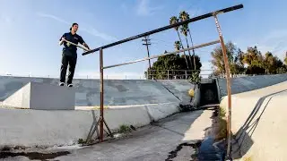 SKATING AN 8 FOOT HIGH RAIL OVER THE LA RIVER!