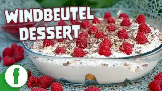 Windbeutel Dessert mit Himbeeren und süßer Quarkcreme