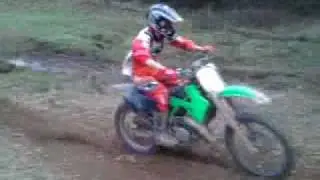 quick vid: 2002 KX125 doing small river/gap jump then small hillclimb