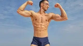 Hunk in Speedos FLEXING Muscles in PUBLIC Beaches 🇹🇿