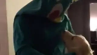 Guy excites dog by dressing as favorite Gumby toy