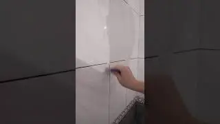 Затирка швов плитки в ванной.