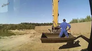 Building earth wall terrace Excavator Cat 320EL
