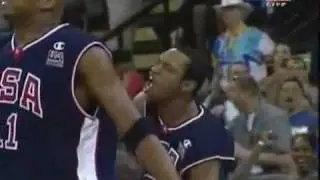 Vince Carter dunks over french player. (USA TEAM)