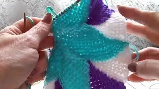 Beautiful rug with knitting needles. Knitting 14-15 wedges. Connecting the fabric.